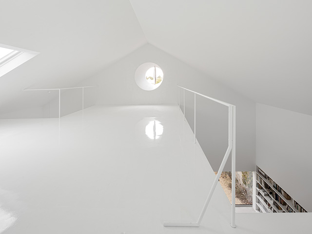 plain white triple height ceiling loft space - grand designs