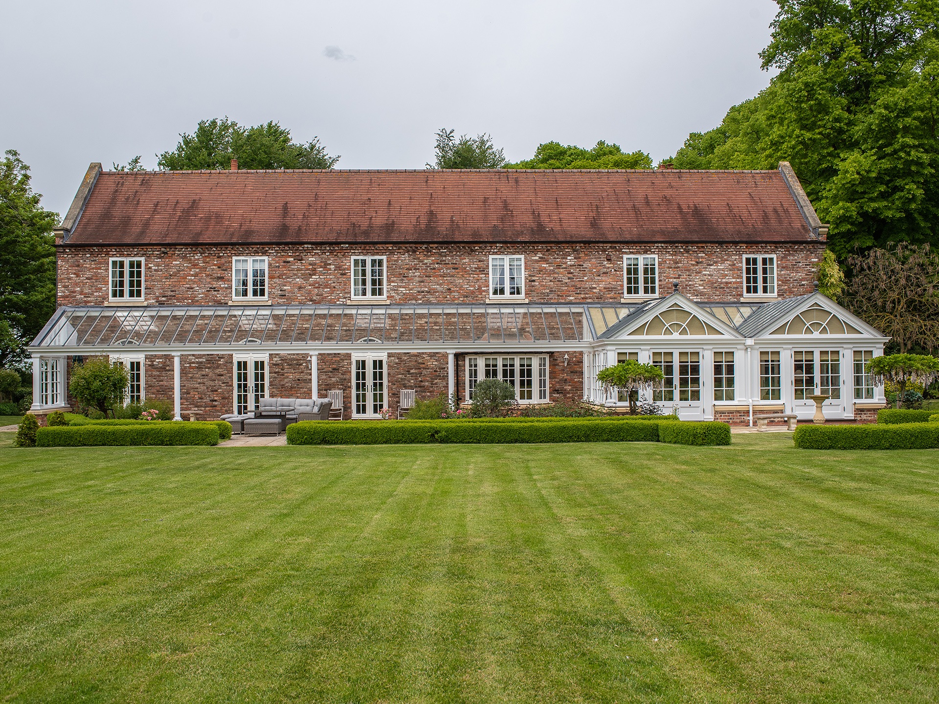 back view of house with glass veranda for a nice welcoming look