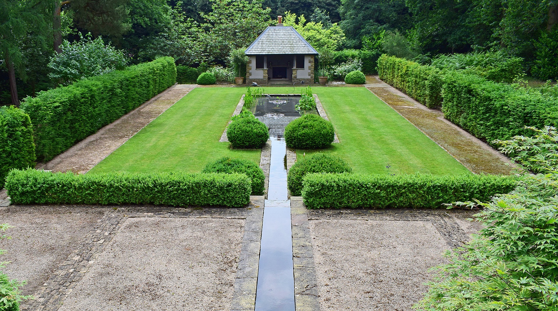 grass and pond in centre