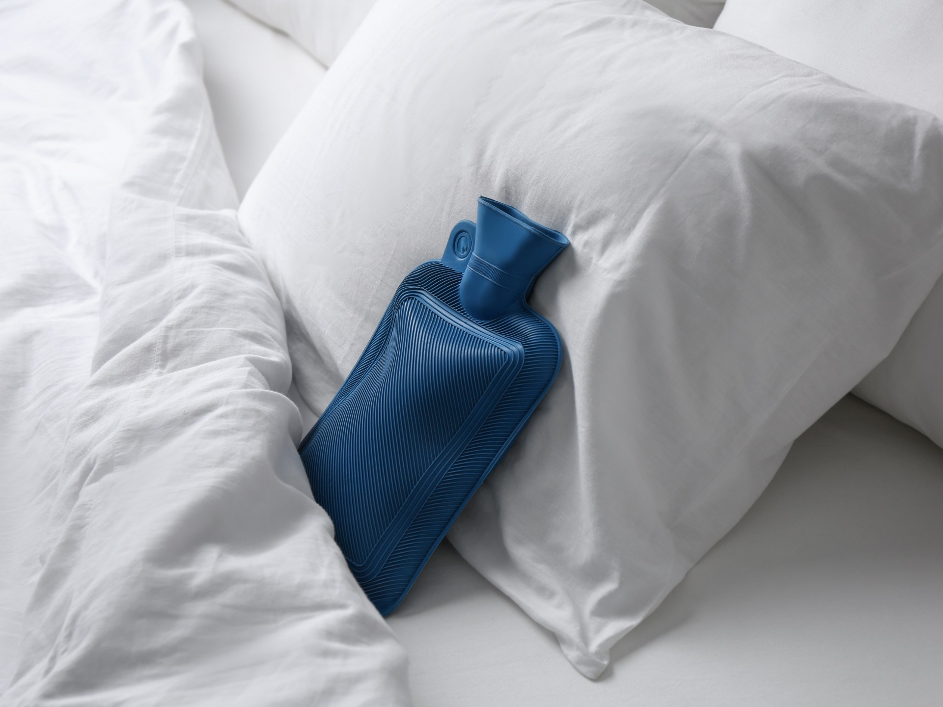 A cold hot water bottle in bed