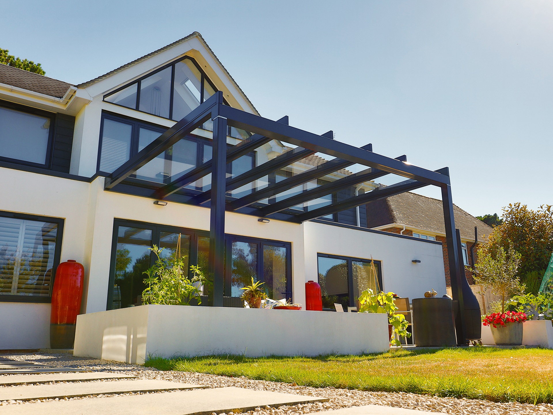 massive house with big veranda looking out to the garden