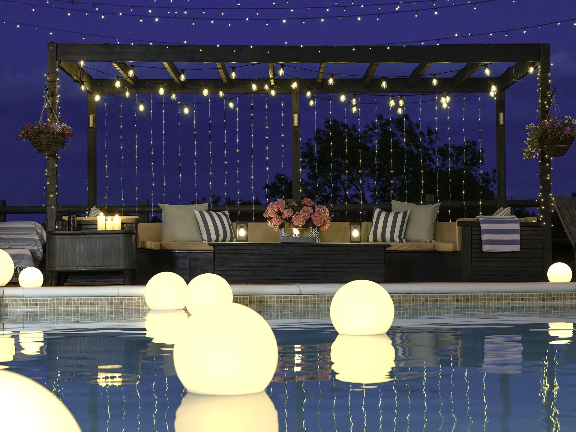 lights with cosy sofa and pool with bobble lights