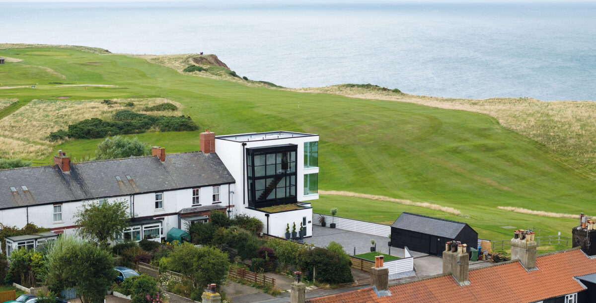 The house is next to a golf course and at the end of a terrace of heritage homes