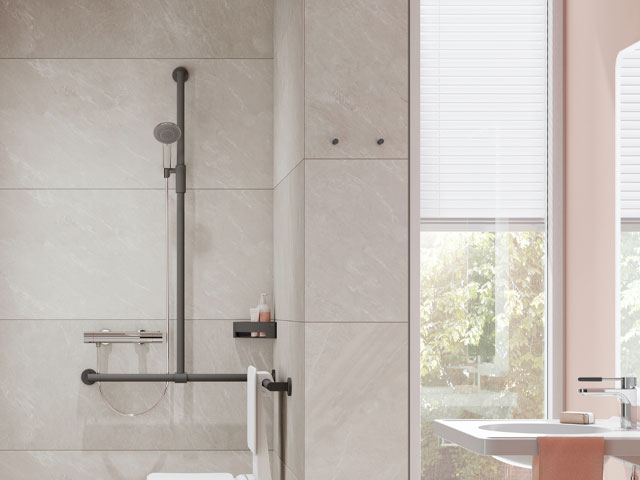 Walk-in shower with magnetic shower rail and fold-down seat