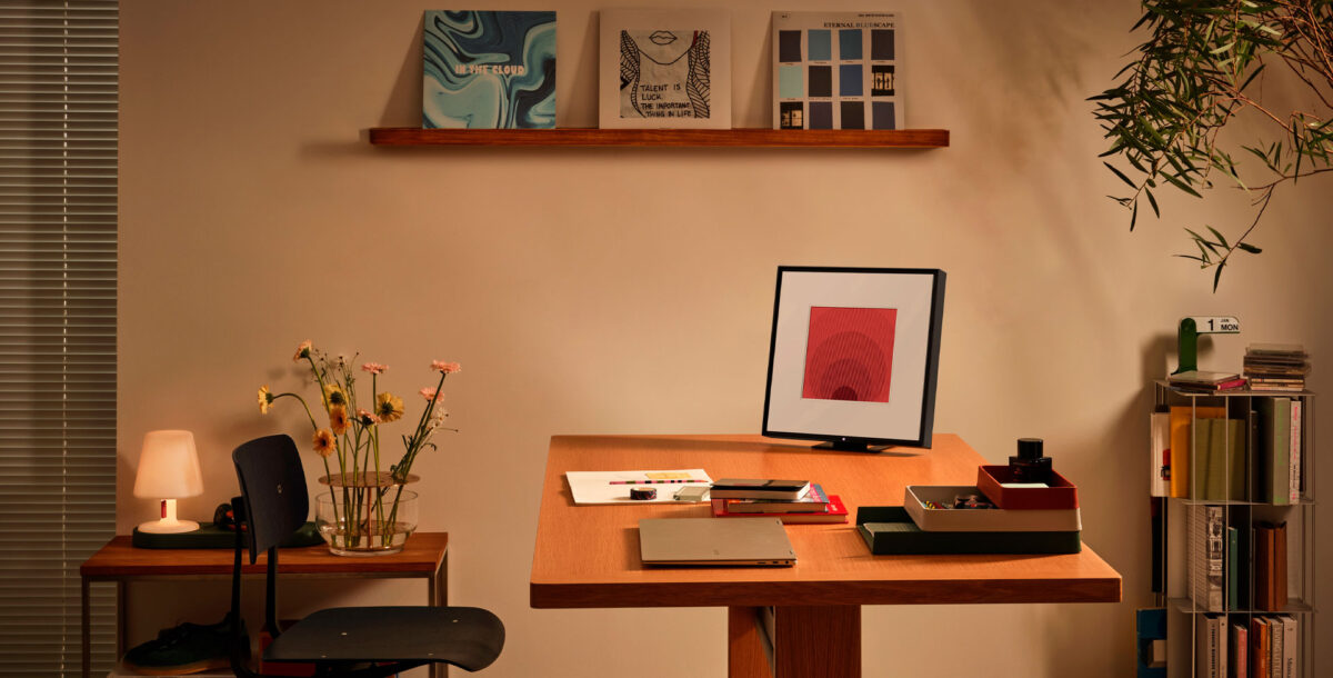 Home office with Samsung Smart Frame screen on work desk