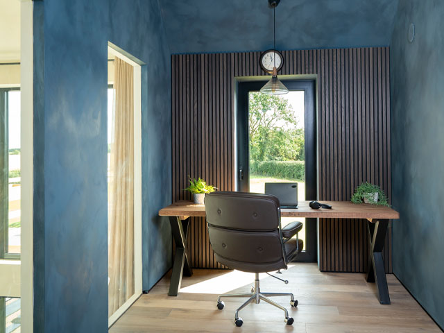 Grand Designs Lincolnshire Wolds' study area with work desk in front of vertical rectangular window