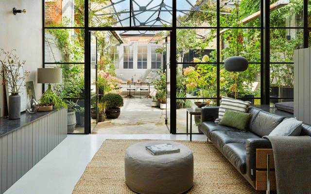 Home in a Victorian dairy conversion including new metal-frame glazing