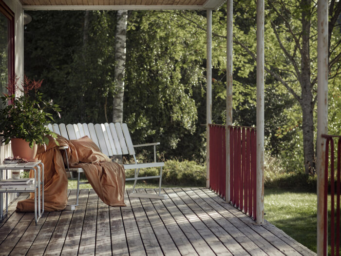 A bench on a porch