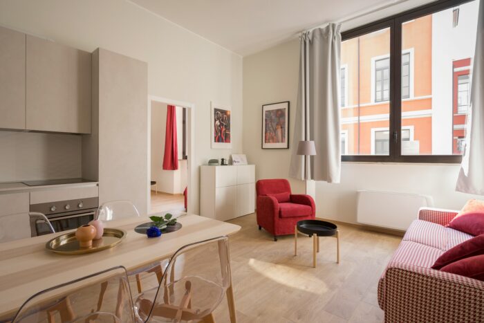 living room with pink pops of colour