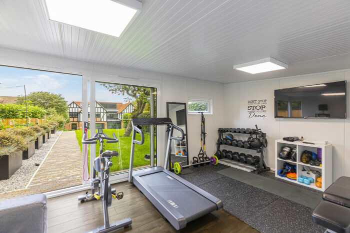 A well equipped garden room gym